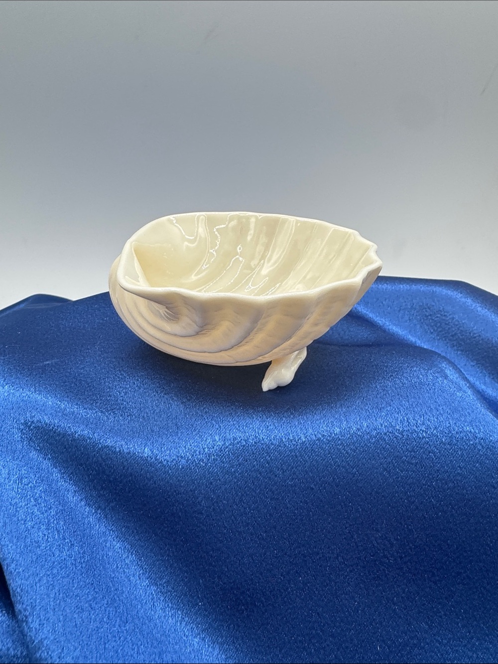 Belleek Small Shell Shaped Dish. Approximately 3” wide 3” deep and 1 1/2” tall